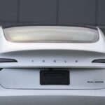 Tesla Profit Declines Despite Revenue Surge as R&D Investment Accelerates