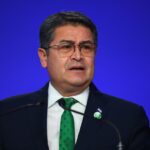Former Honduran President Hernández Returns Home After Trump Pardon, Faces Corruption Charges