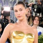 Hailey Bieber Shares Summer Photo Carousel Featuring Vibrant Yellow Bikini