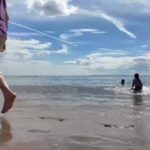 Coney Island beachgoers soaking it in before school starts