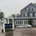 Drivers rescued from flooded roads in Connecticut after rain slams area