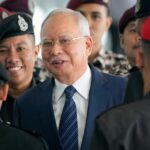 Malaysia’s king allows former leader Najib to serve rest of his graft sentence under house arrest