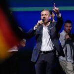 German chancellor faces tough times after first far-right party’s state election win since Nazi era