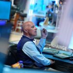 Asian shares are mixed after global bond sell-off and drop in oil prices