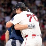 Red Sox starter records an out in hilarious fashion by hugging Mariners’ baserunner